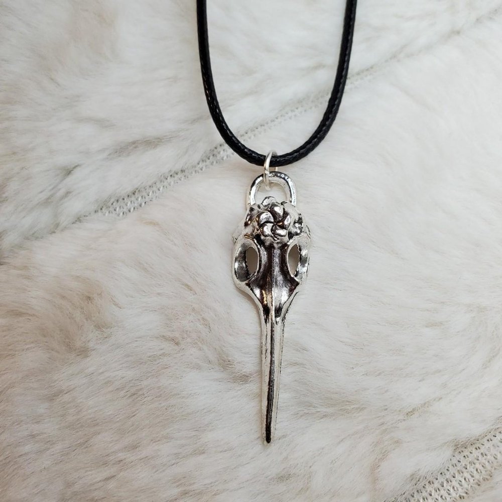 Bird skull plague doctor charm necklace.
